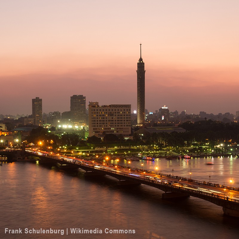 View of the Nile with the Qasr El Nil Bridge and the Cairo Tower in the background.